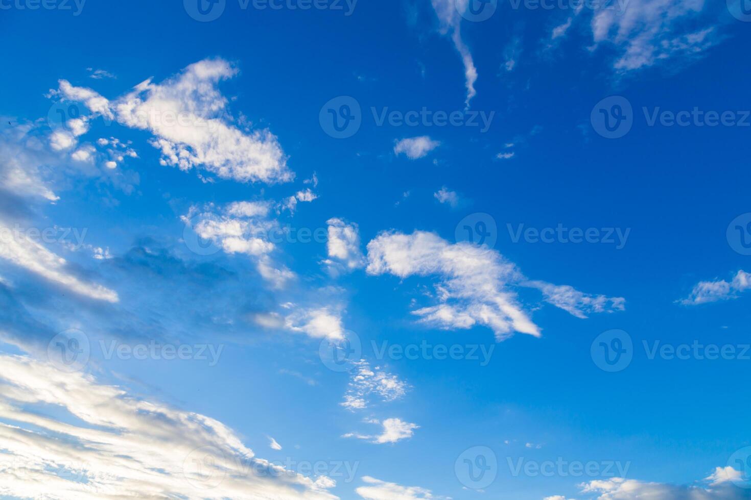 blue sky with tiny clouds photo