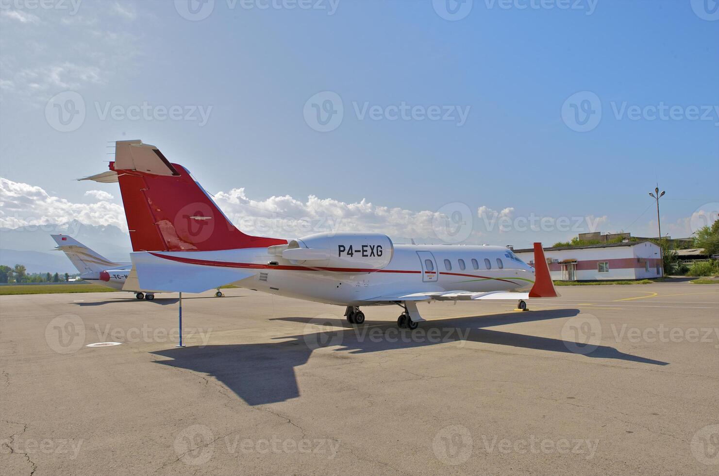 business plane parked at the airport photo
