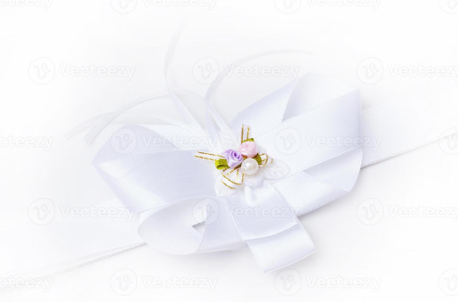 gift ribbon and bow isolated over white photo