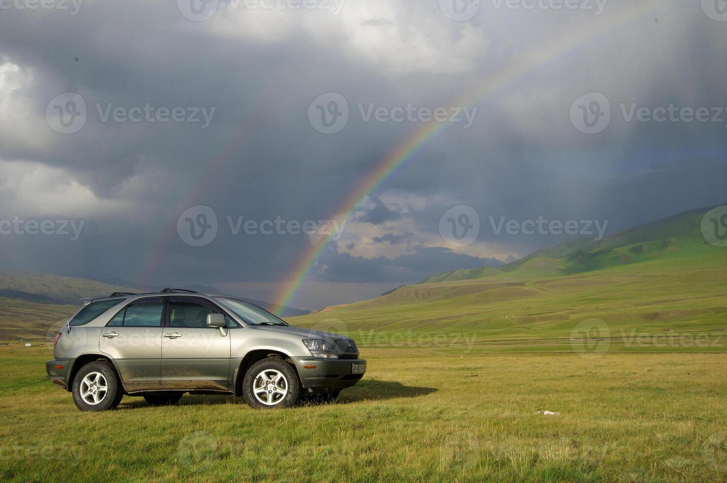 Off-road car highly in mountains photo