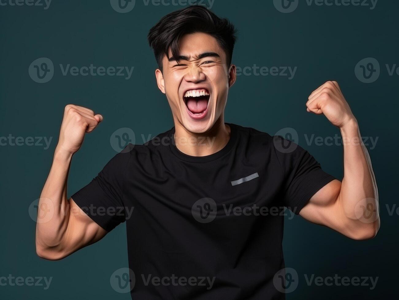 Asian man dressed in sportswear clearly active and full of energy photo