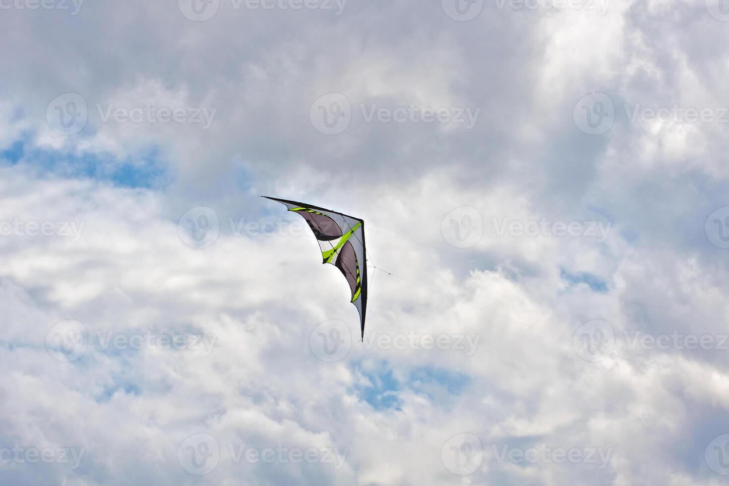 A Man flying his kite at the steppe photo