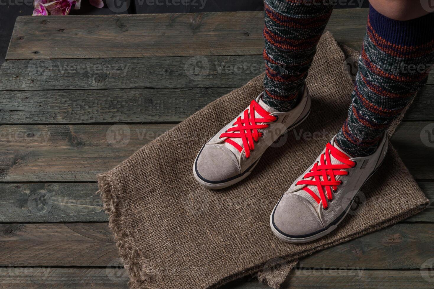 Color socks on a wooden floor photo