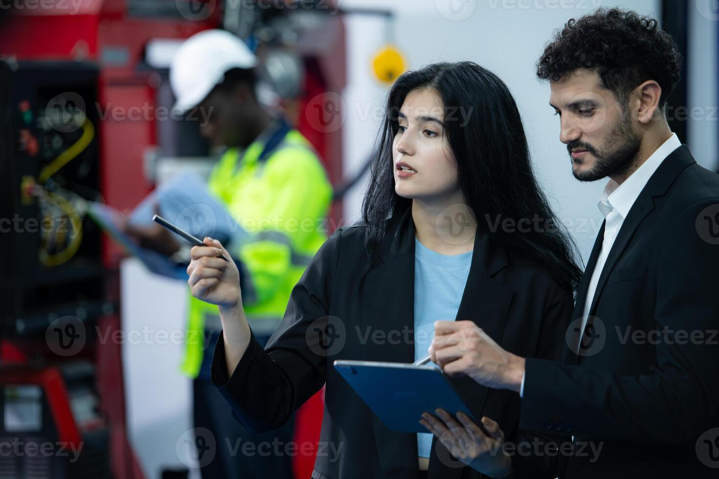 Portrait of businessperson of factory industry inspection and testing of robots arm for use in large-scale complex manufacturing industries. photo