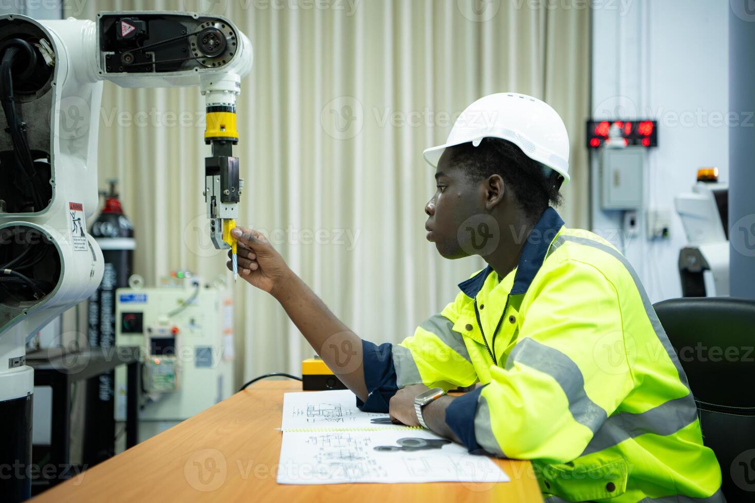Engineers assembled and tested the functionality of a robotic arm utilized in small industries. photo