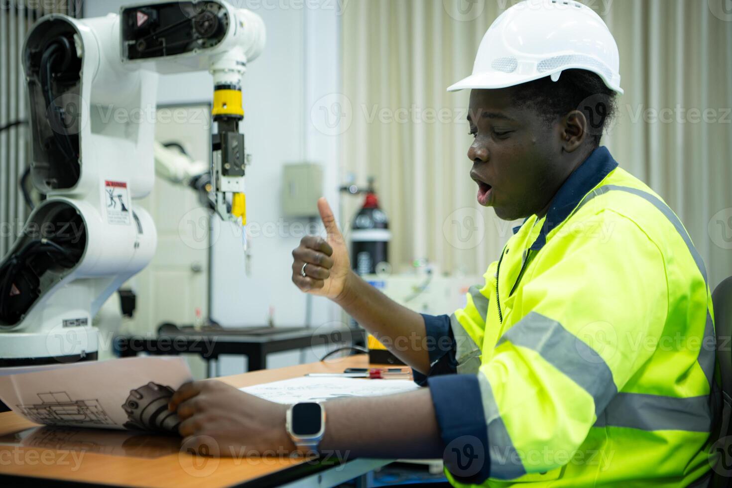 Engineers assembled and tested the functionality of a robotic arm utilized in small industries. photo