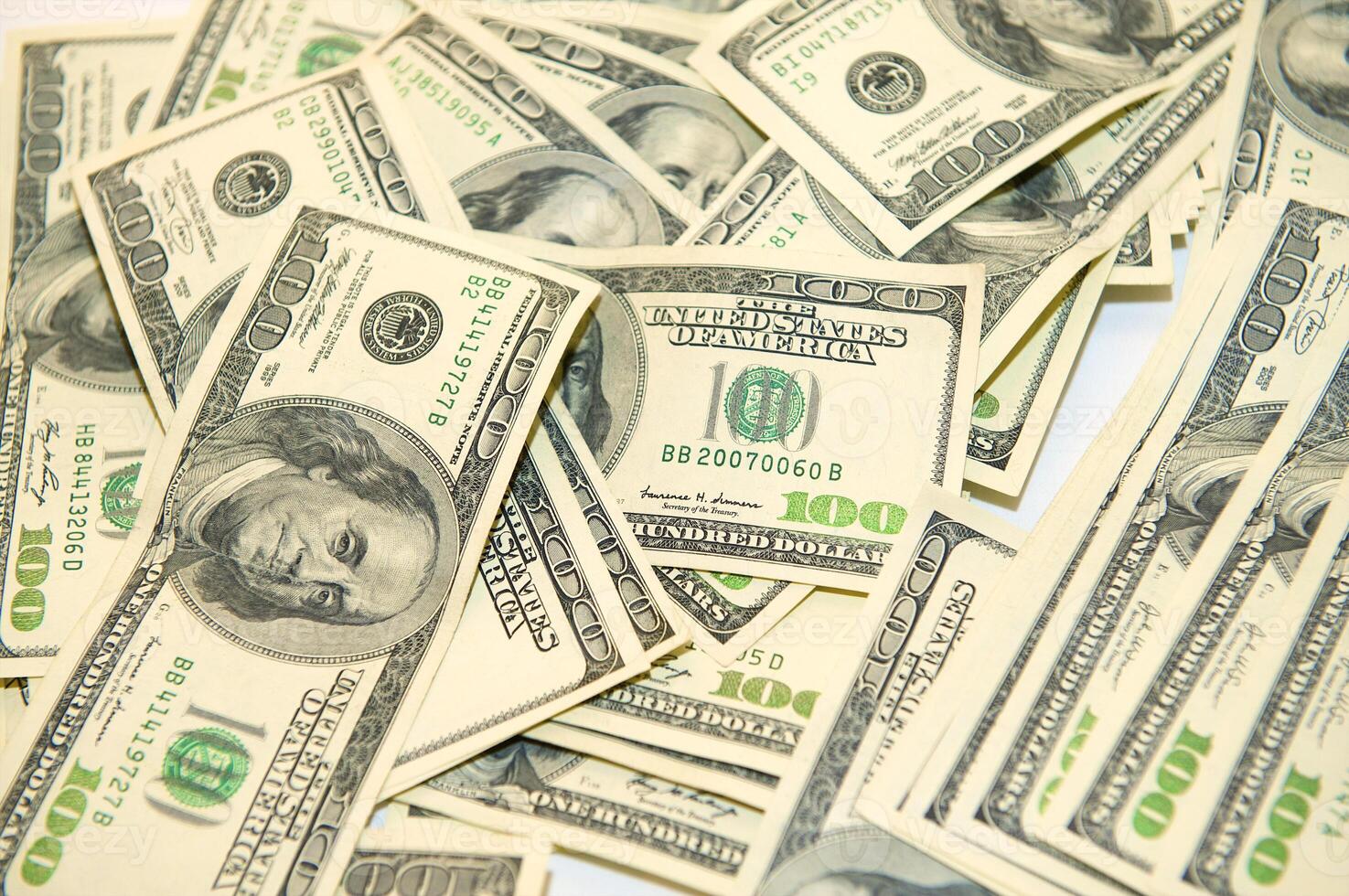 American dollars arranged in stacks of 100 bills each photo