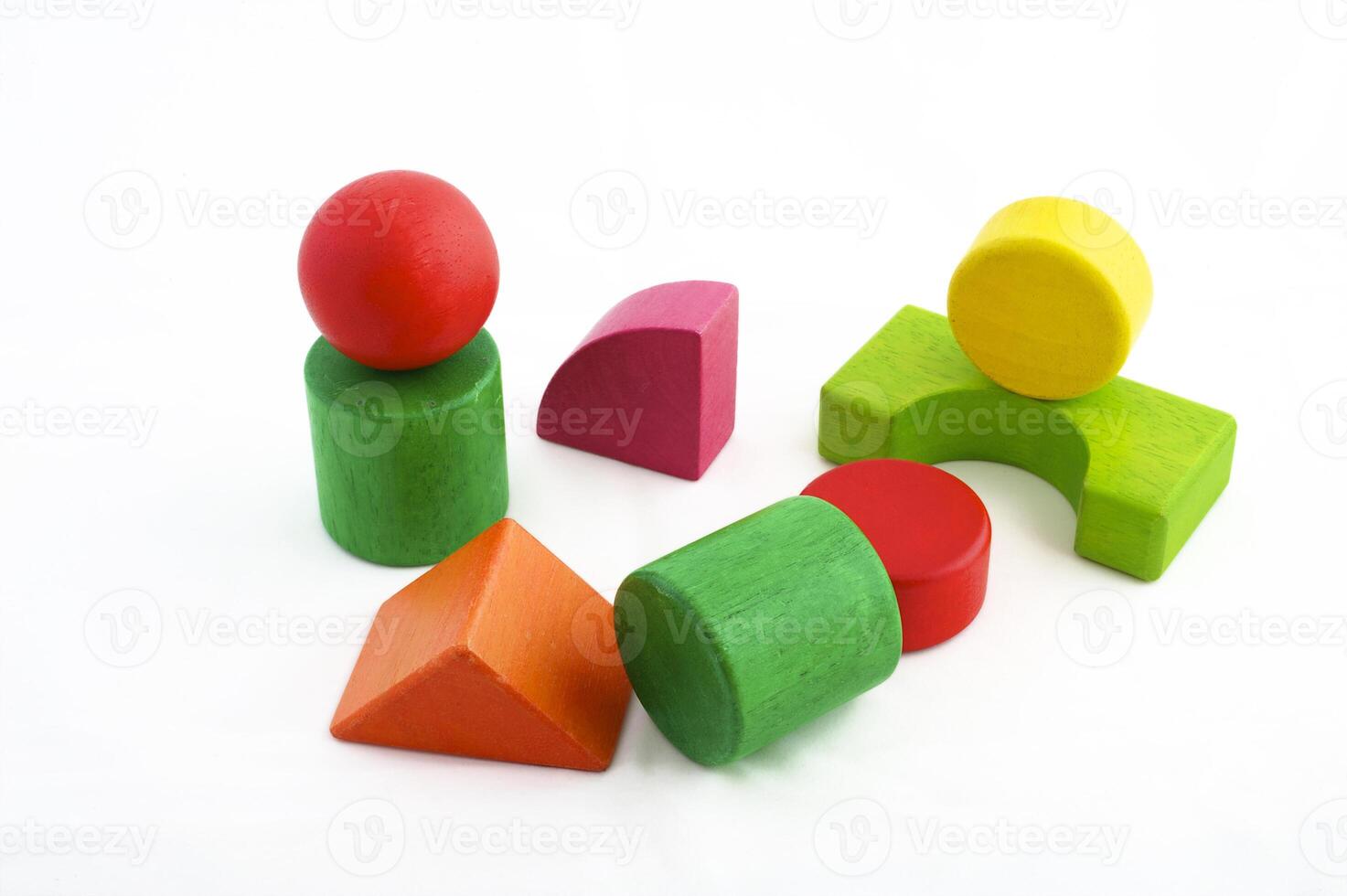Wooden toy blocks on white background photo