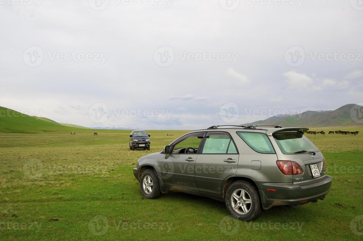 Off-road car highly in mountains photo