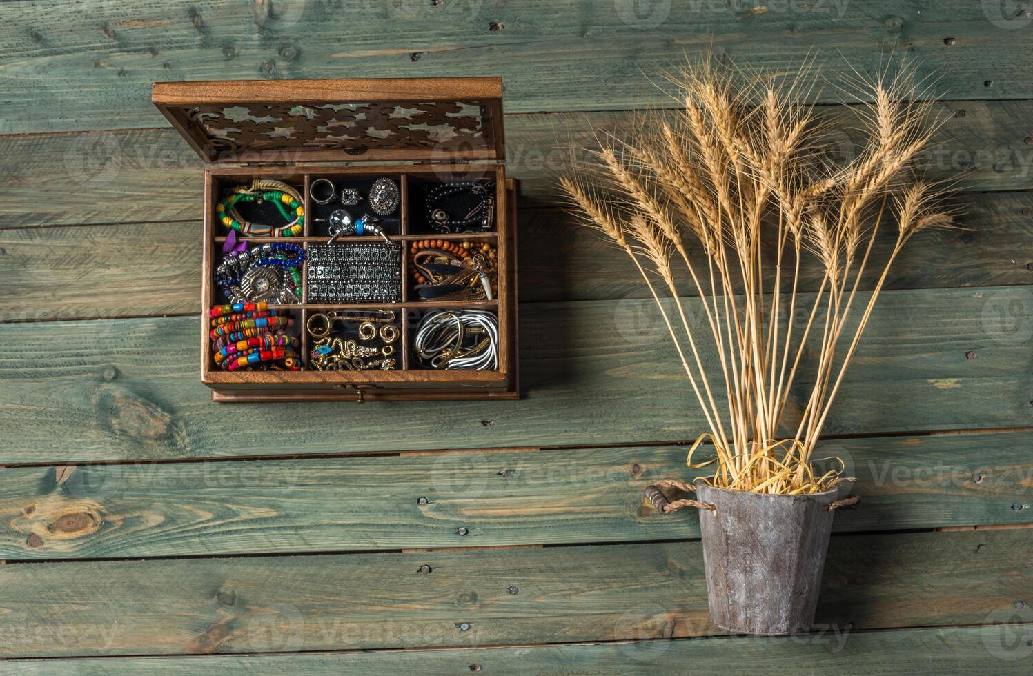 necklace and beads on a wooden background photo