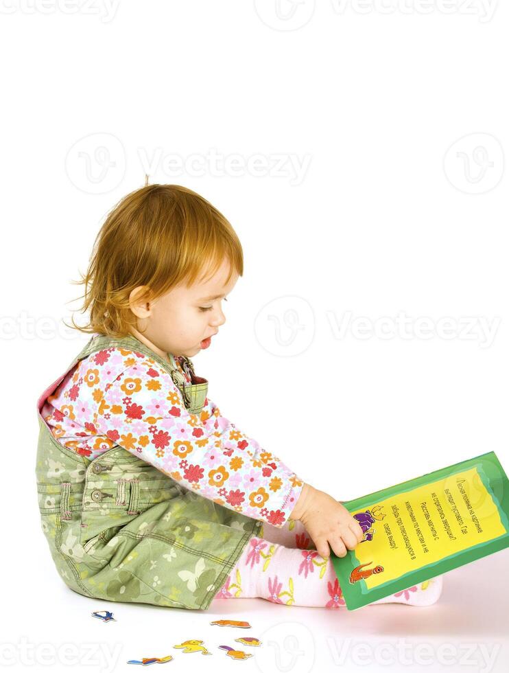 girl reads the book photo