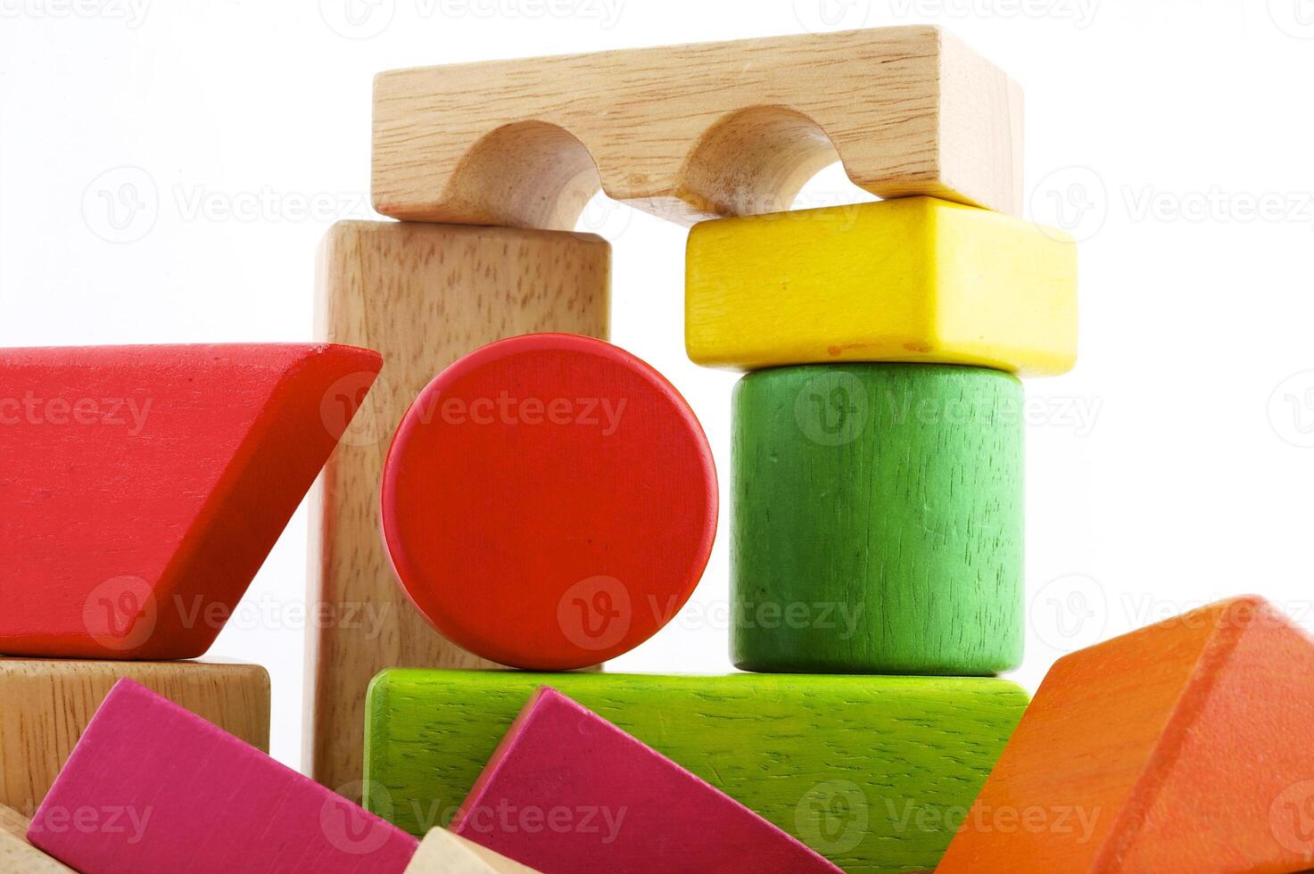 Wooden toy blocks on white background photo