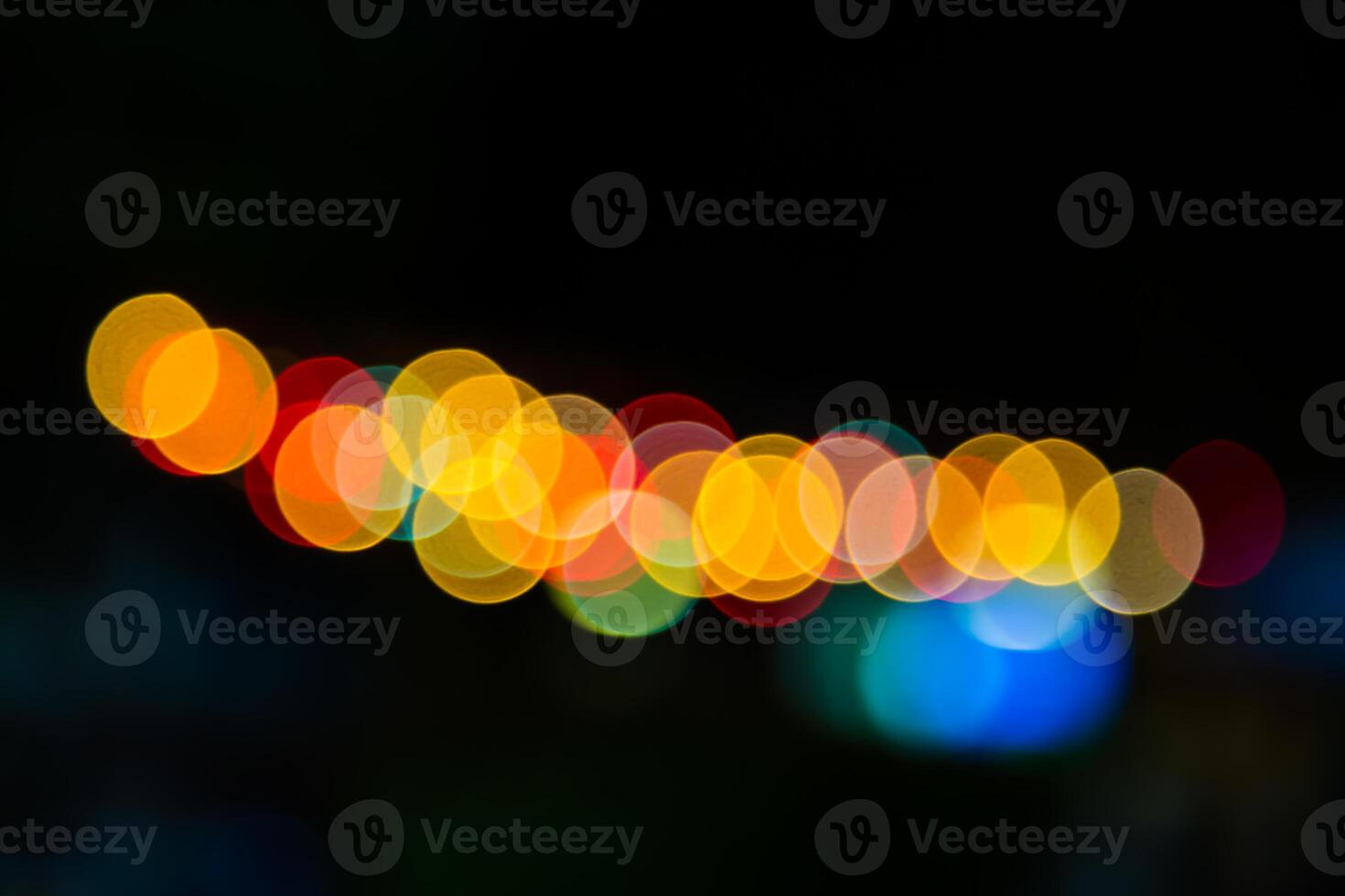 Color Bokeh against a dark photo