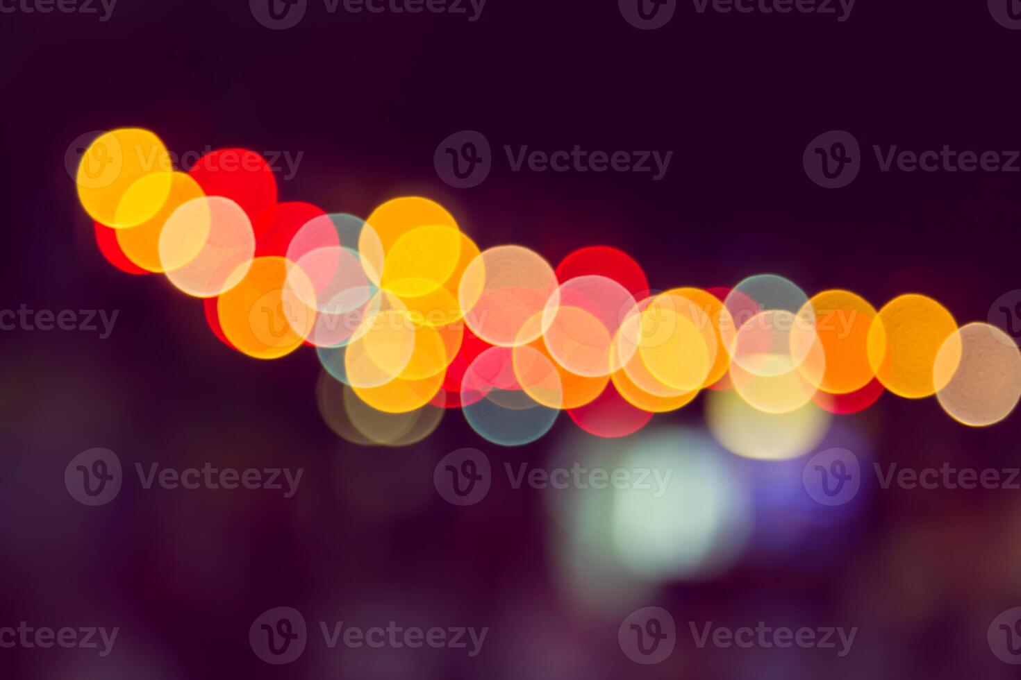 Color Bokeh against a dark photo