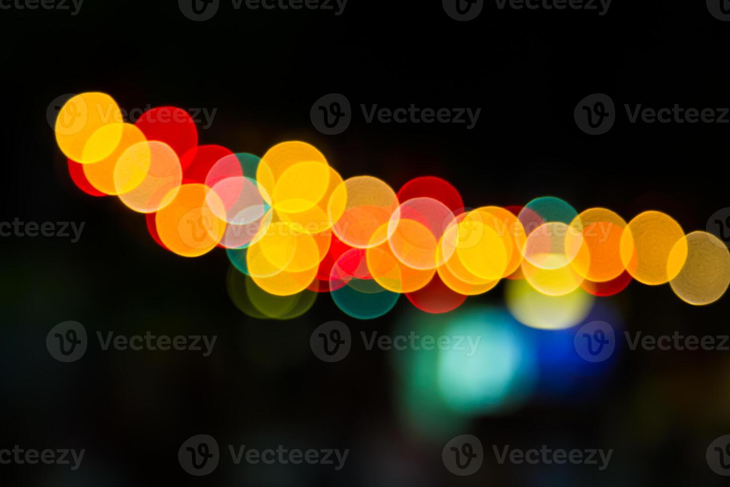 Color Bokeh against a dark photo