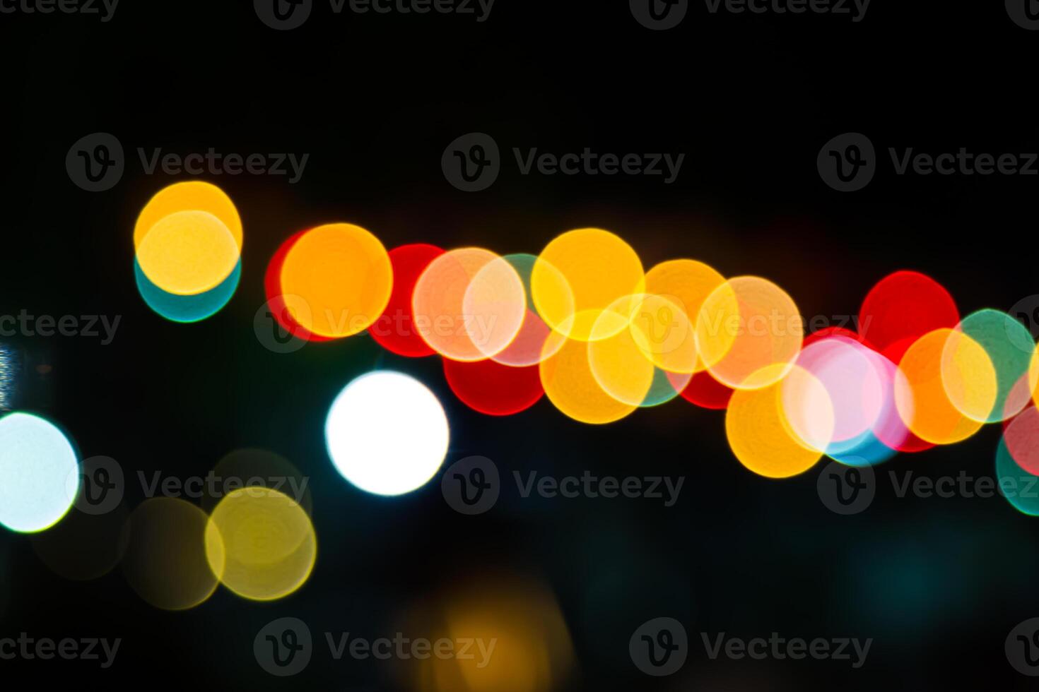 Color Bokeh against a dark photo