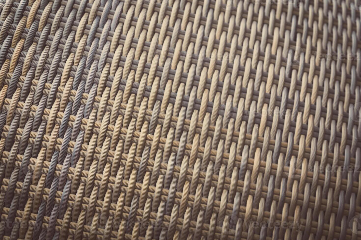 Synthetic rattan texture weaving background as used on outdoor garden furniture. photo
