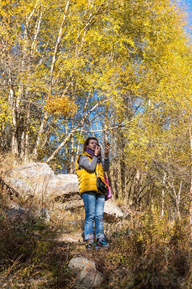 Autumn photo after snowfall, mountain lake Issyk in Almaty region, Kazakhstan. October.
