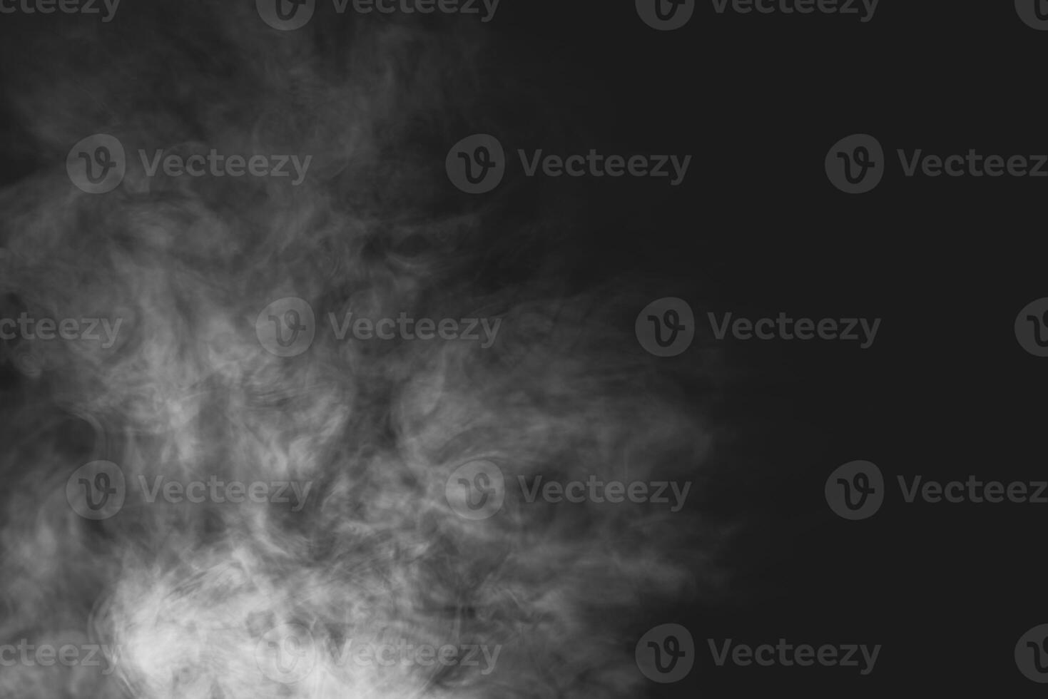 White smoke isolated on black background photo