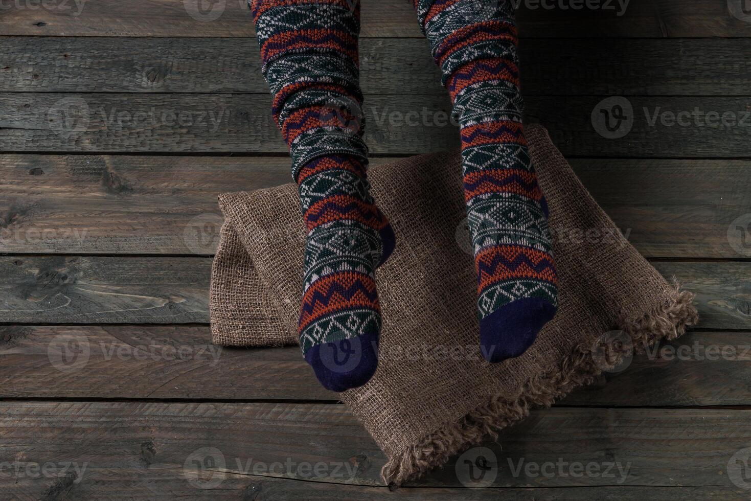 Color socks on a wooden floor photo