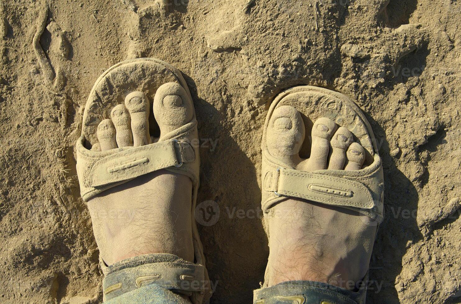 Feet in the dust photo