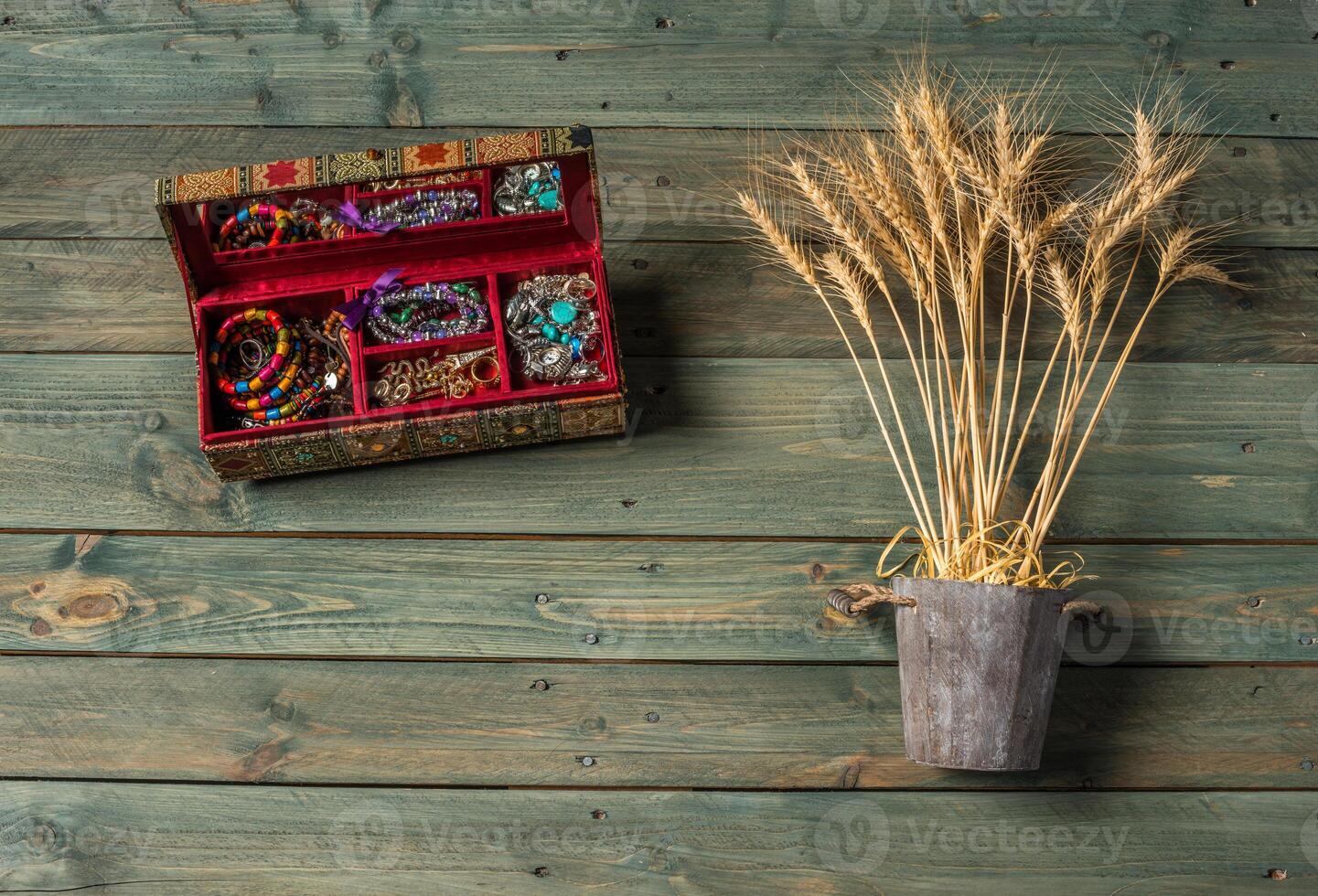 necklace and beads on a wooden background photo