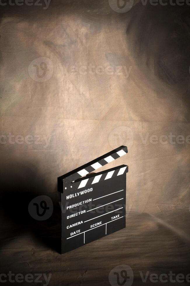 Clapstick on the background photo