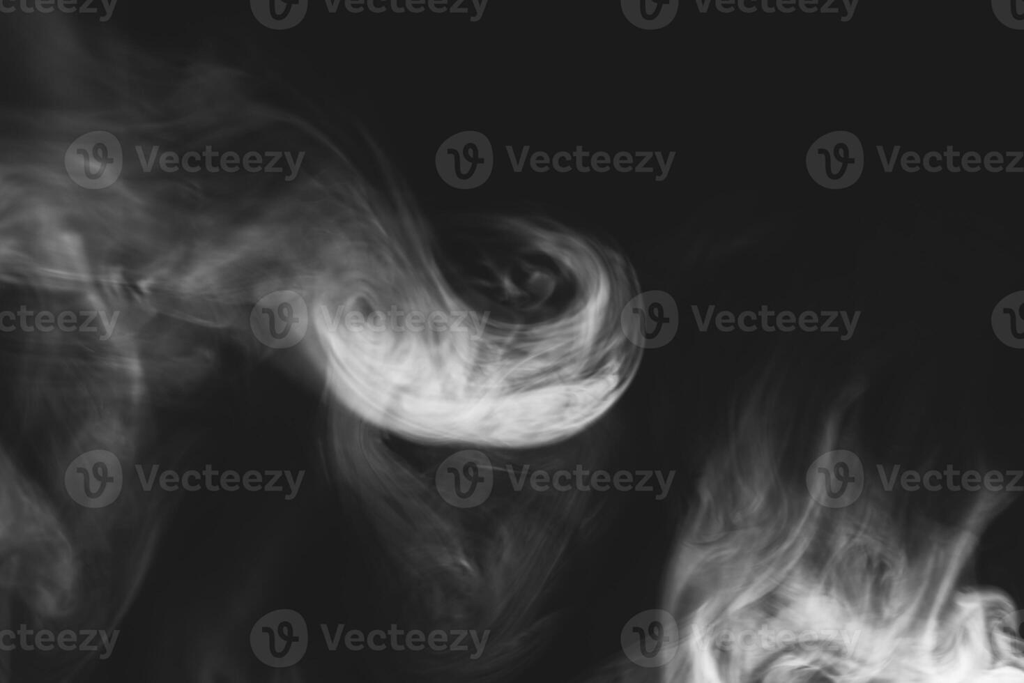 White smoke isolated on black background photo
