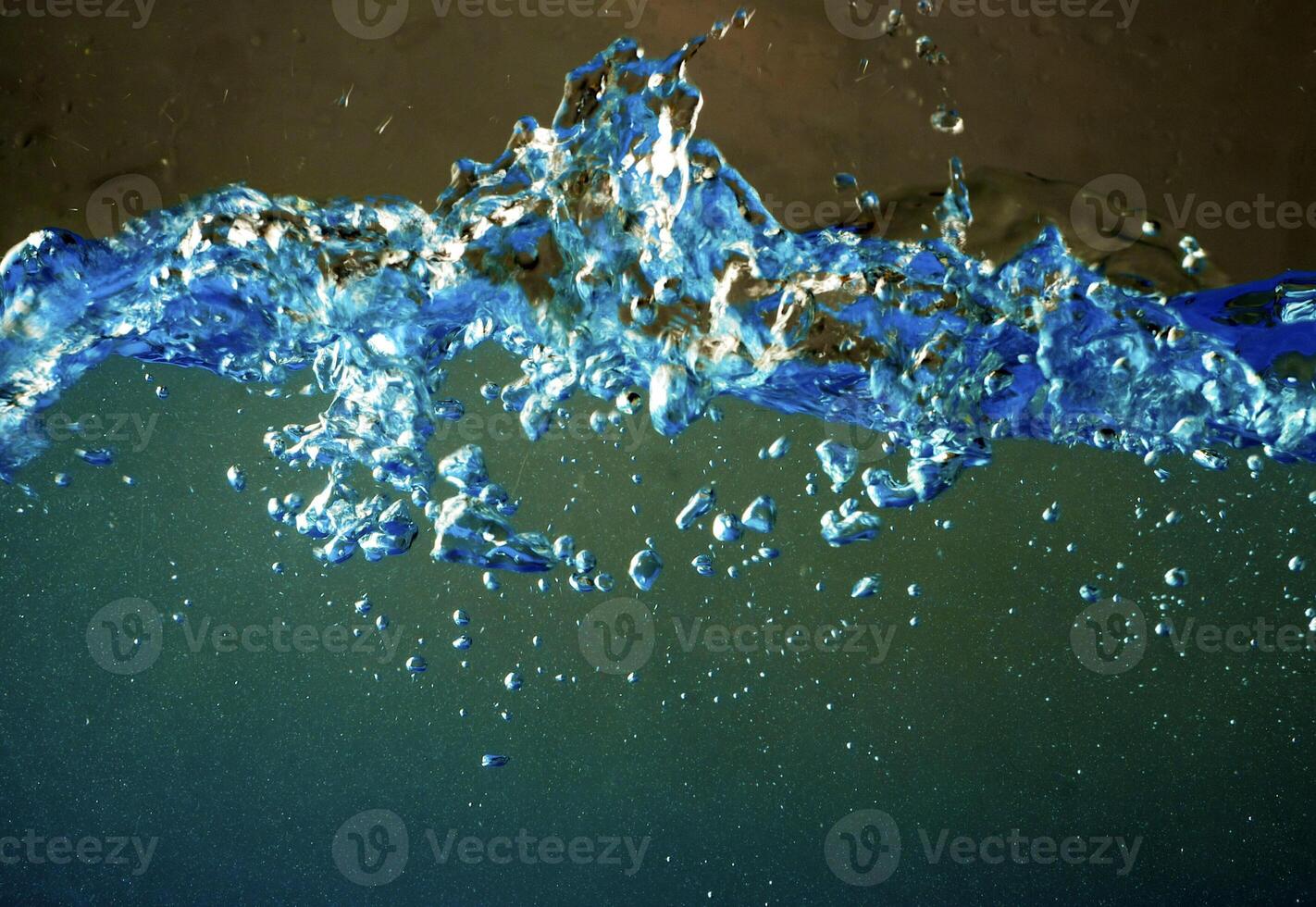 Fresh water with waves and bubbles photo