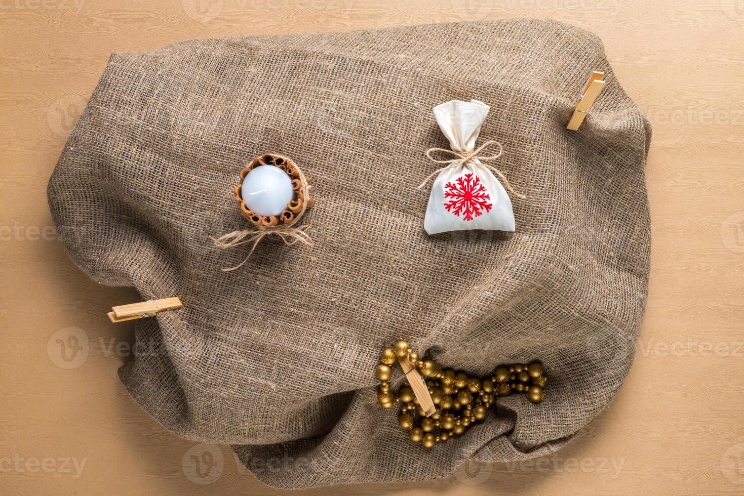 Christmas decoration on natural sackcloth background photo