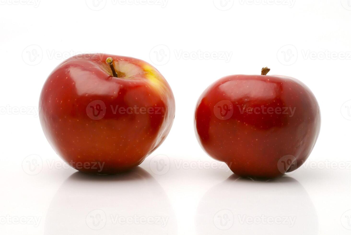 Ripe red apples on a white background photo