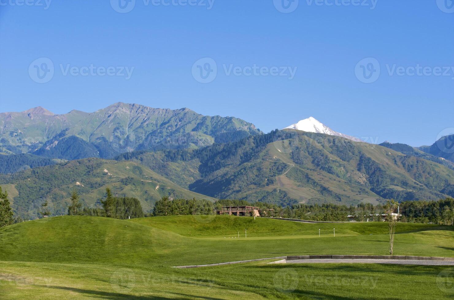 Fine golf club in foothills of Zailiyskiy Alatau photo