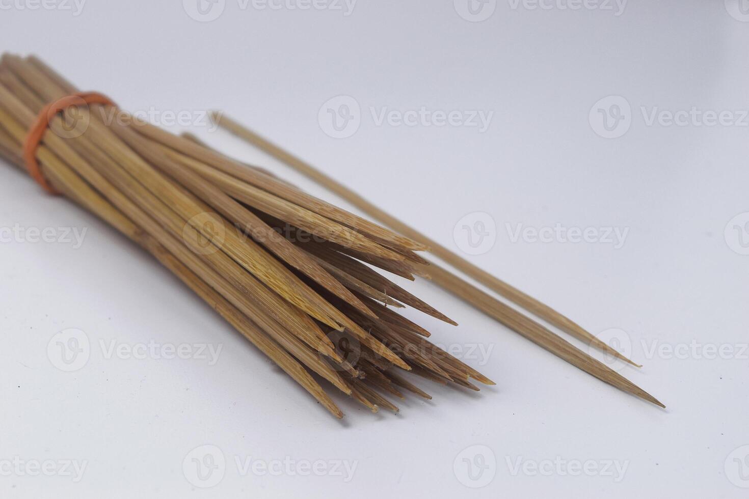 Some skewers made of bamboo are often used by Indonesians to make goat satay photo