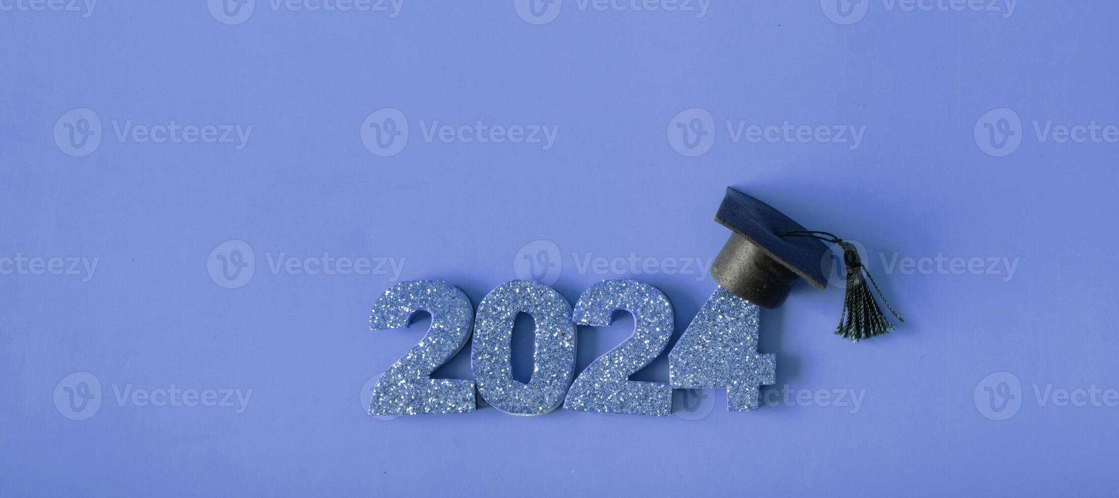 Golden glitter number 2024 with graduated cap. Class of 2024 concept. photo