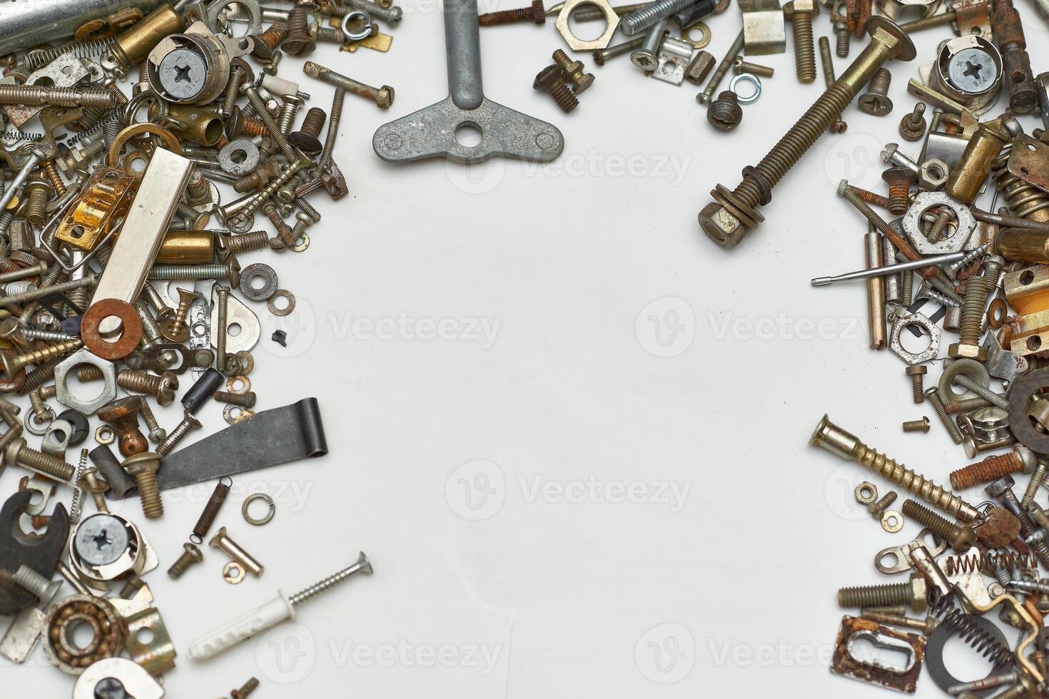 Iron small metal trash. Lots of different nuts, bolts, washers photo