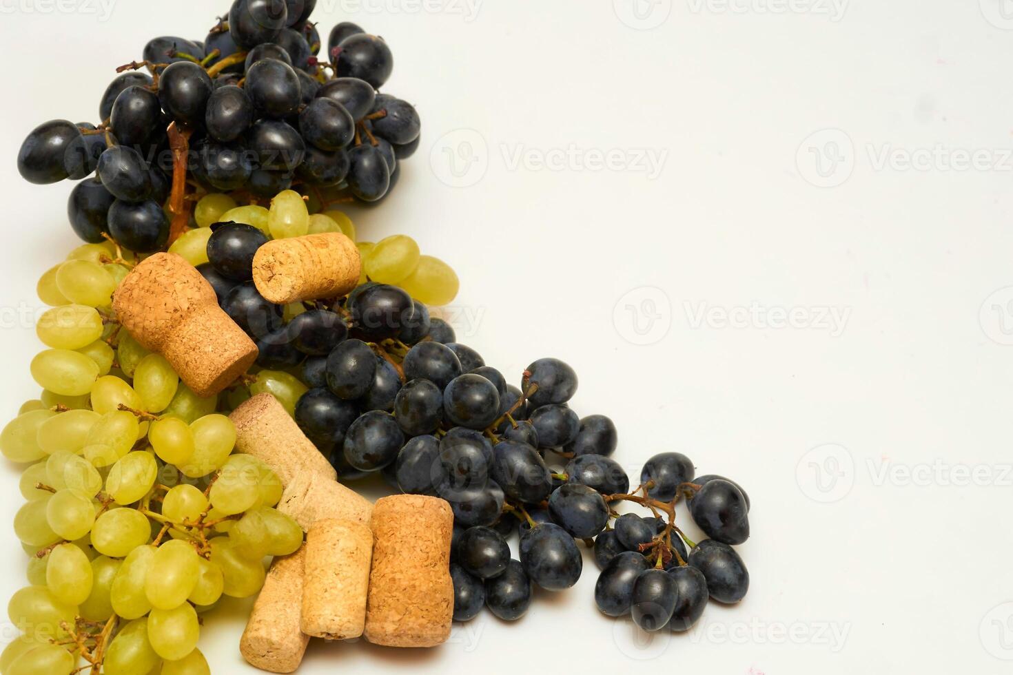 Wine stopper. Good old brandy, cognac,wine, black ripe grapes photo
