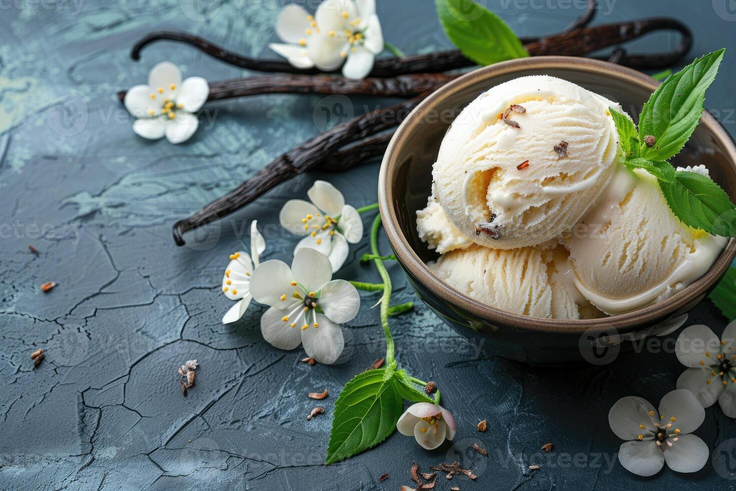 Vanilla ice cream with flowers and vanilla pods photo