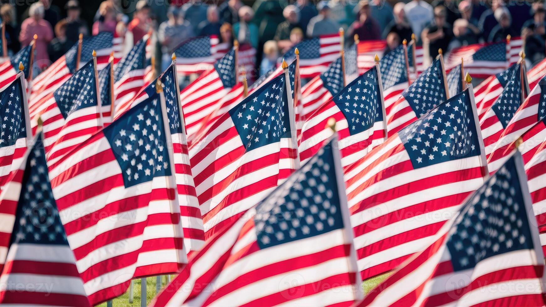 Rows of American flags waving in the breeze during a patriotic festival or national holiday Memorial day. photo