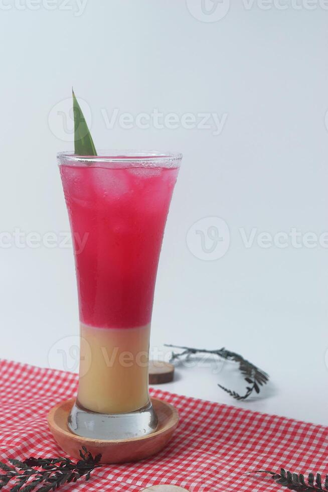 Close up photo of red soda mixed with milk is called Soda Susu or Soda Gembira
