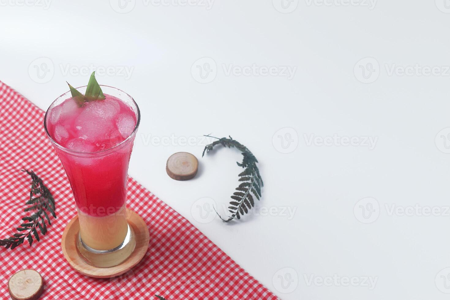 Red soda mixed with milk is a typical Indonesian drink is Soda Gembira photo