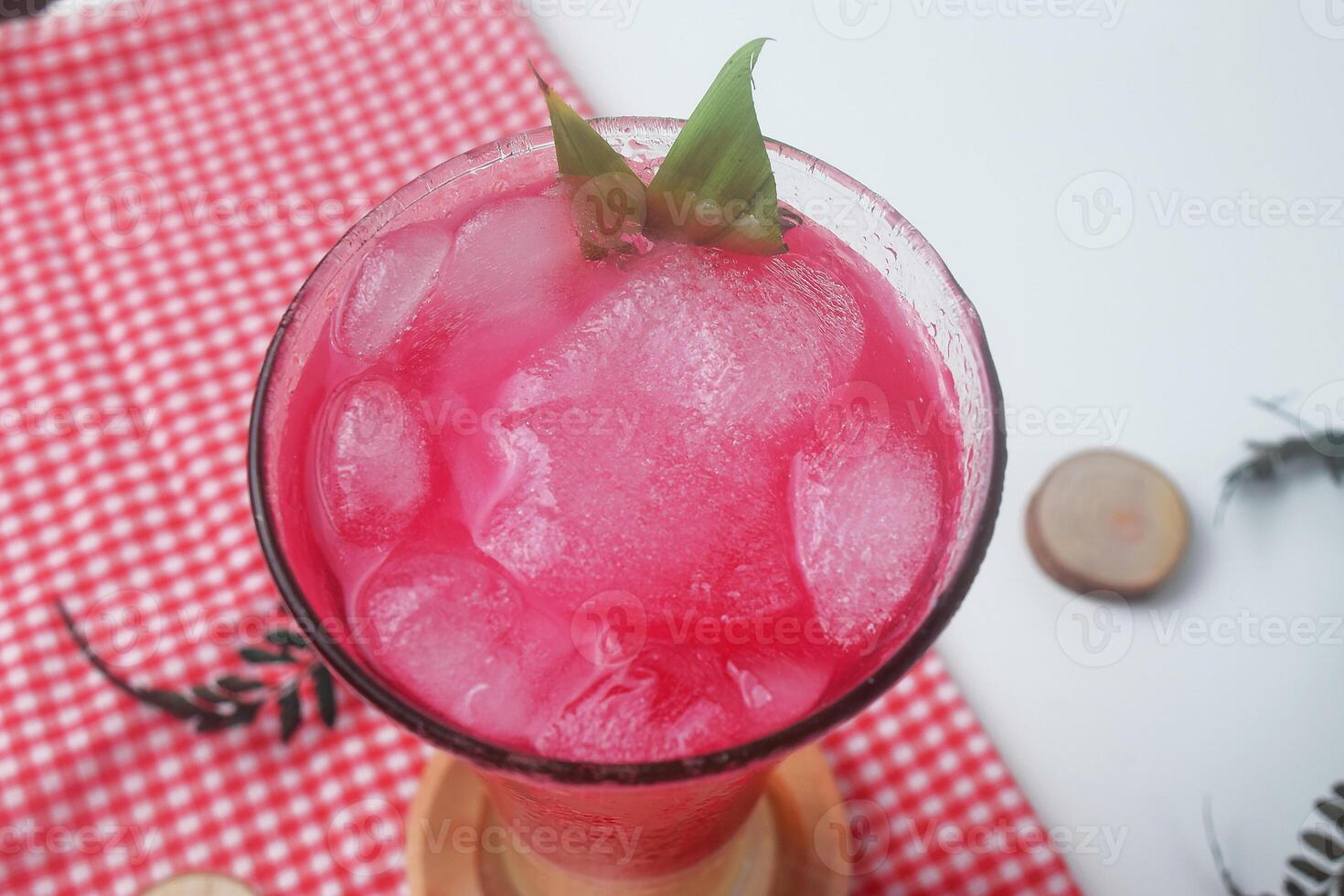 Close up photo of red soda mixed with milk is called Soda Susu or Soda Gembira