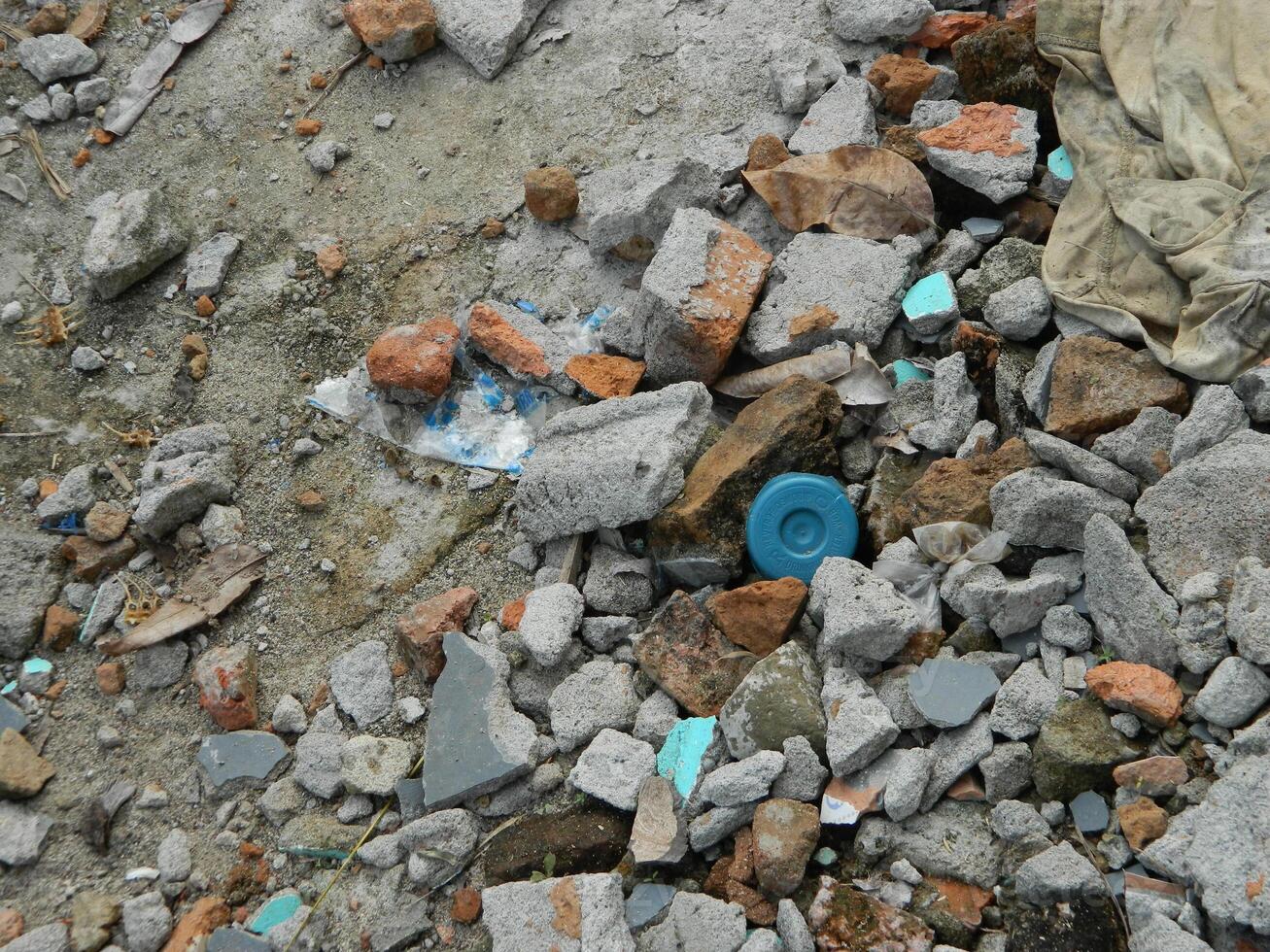 Waste that can damage the environment is often found in urban areas with poor waste management photo