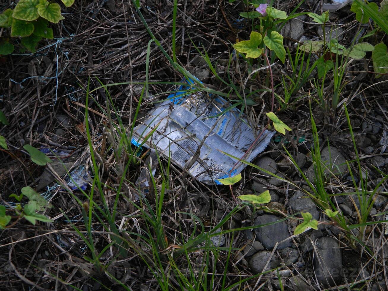 Waste that can damage the environment is often found in urban areas with poor waste management photo