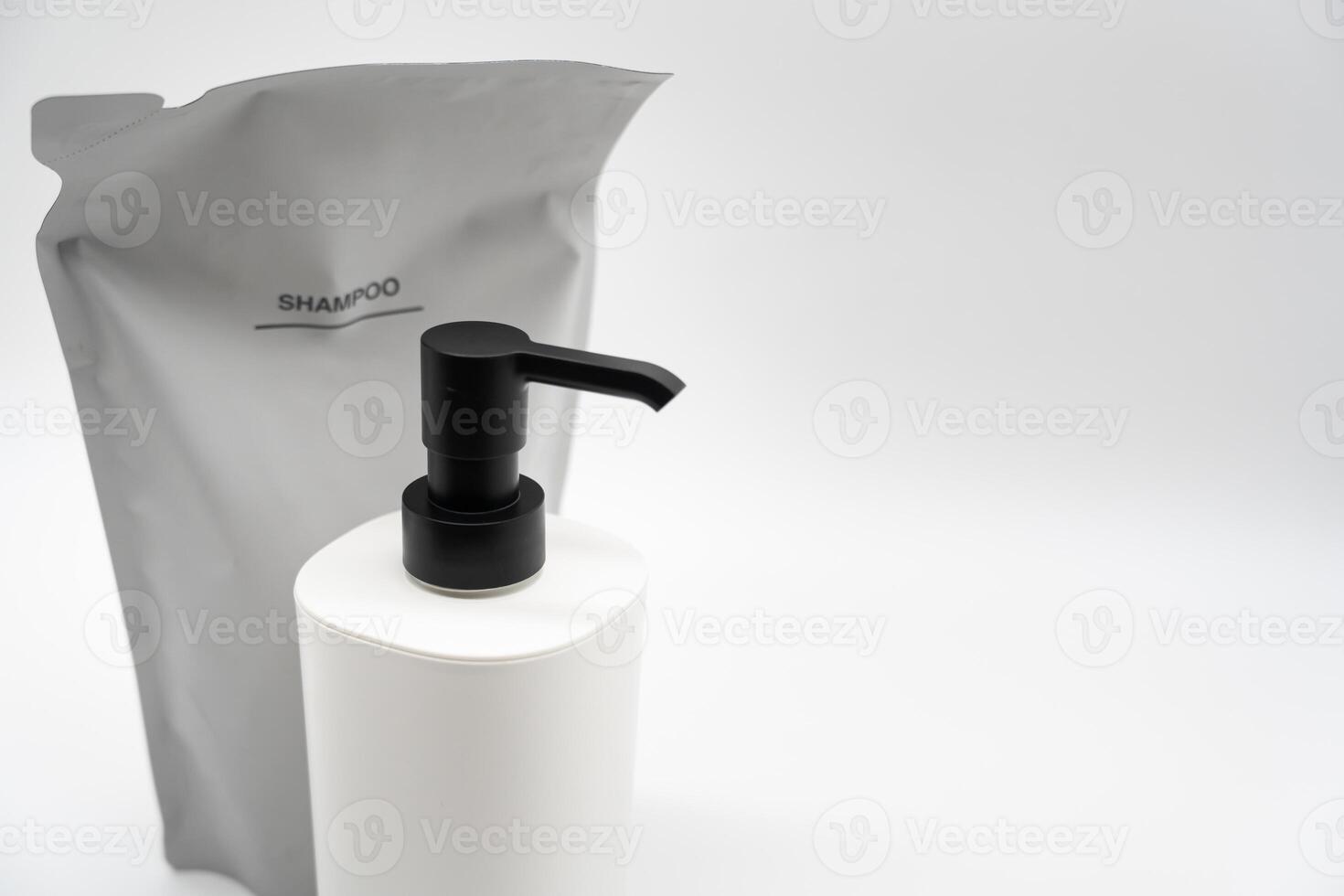 Plastic packaging for refill pouch and Plastic pump bottle in isolated background. Zero waste. Reuse reduce recycle concept. Refillable reusable personalised pump dispenser bottles. photo