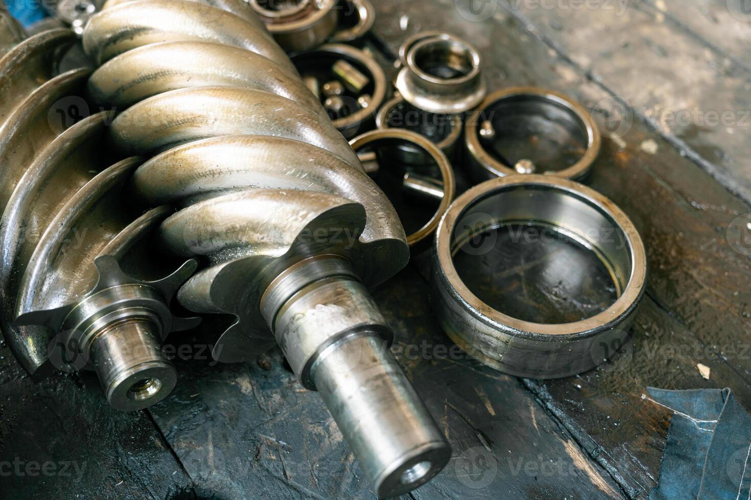 Old bearing and screw compressor that has been in operation for a very long time. photo