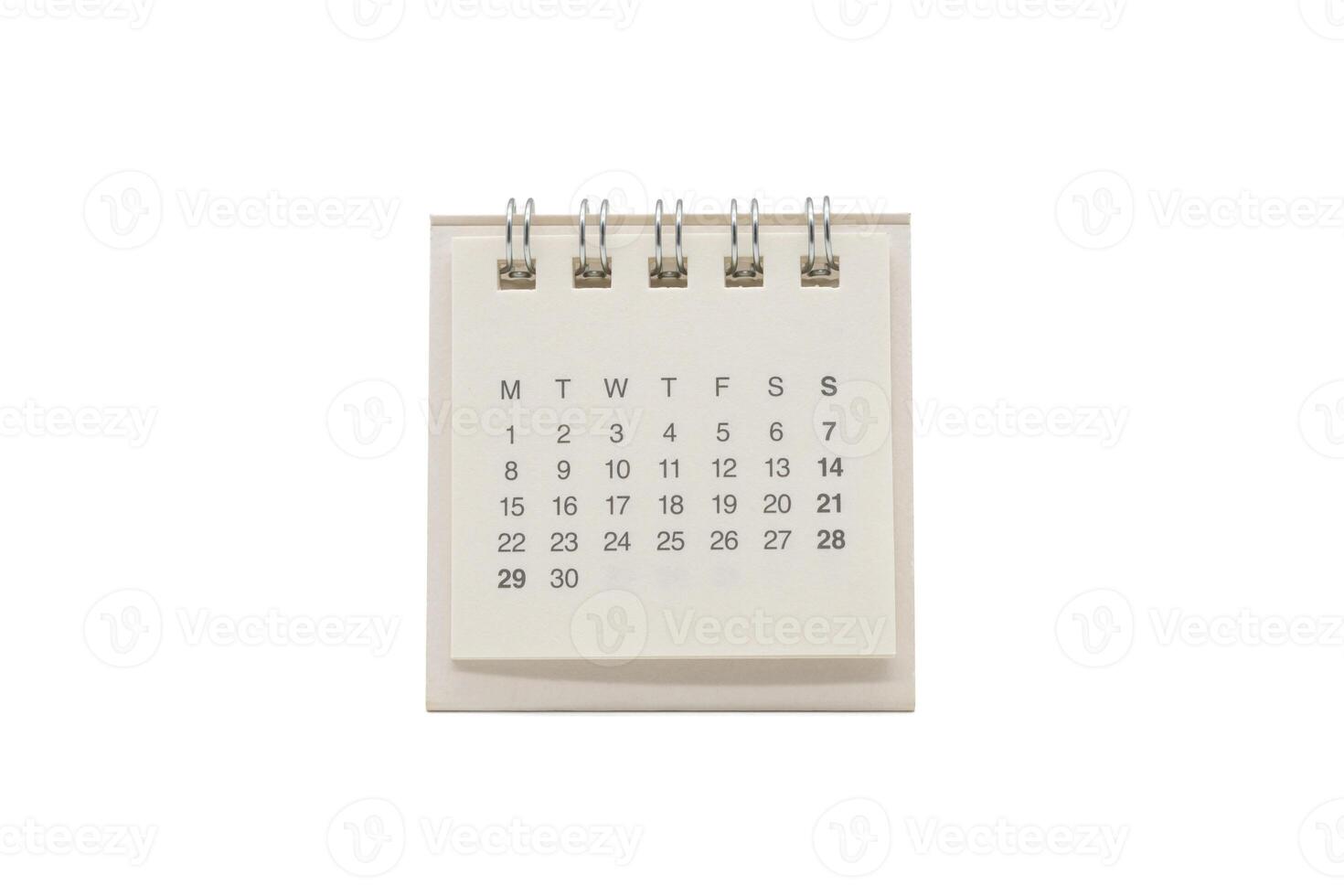 Paper mini desk calendar isolated on white background. Calendar has no months and no years. photo