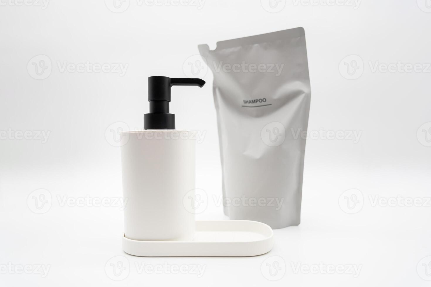 Plastic packaging for refill pouch and Plastic pump bottle in isolated background. Zero waste. Reuse reduce recycle concept. Refillable reusable personalised pump dispenser bottles. photo