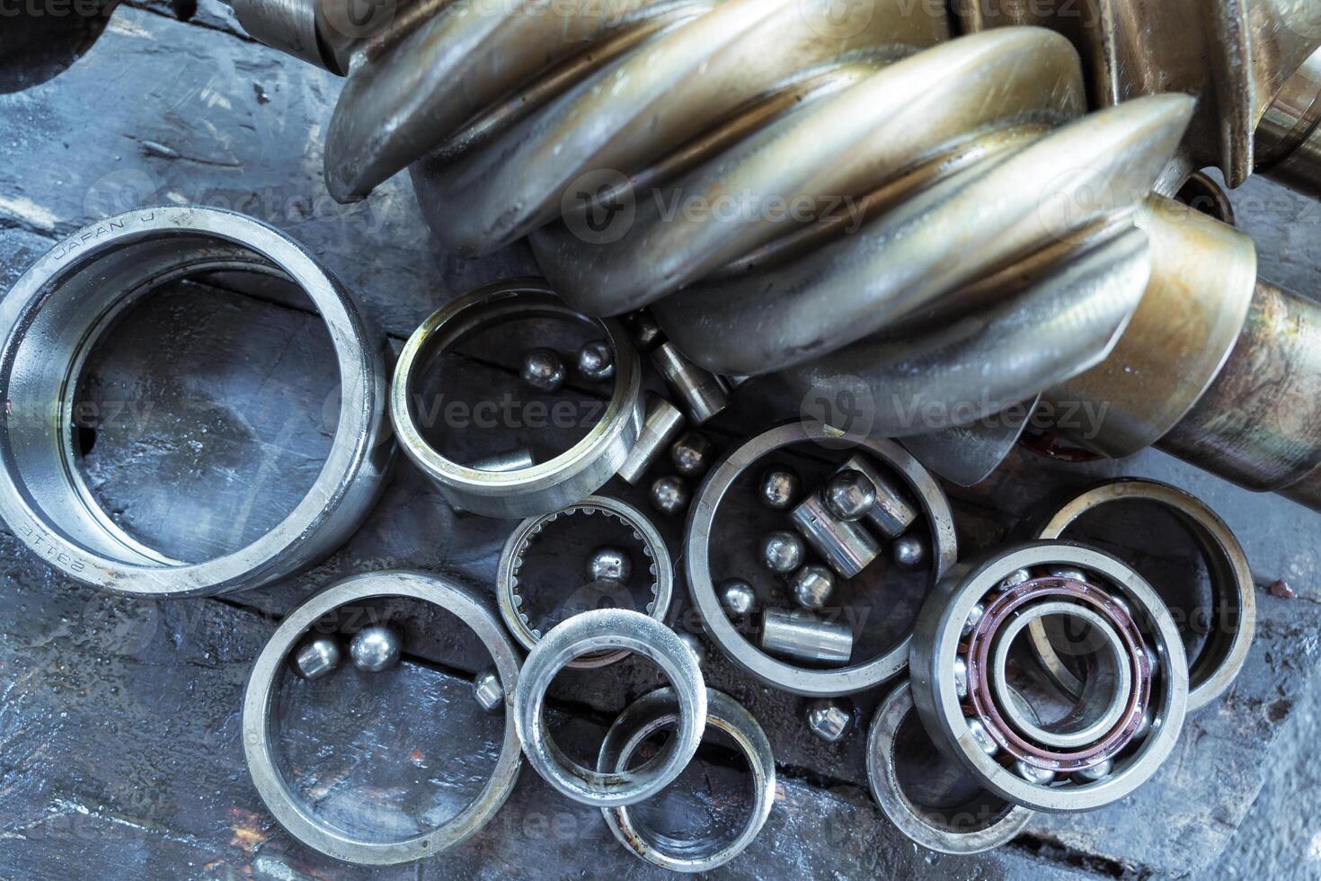 Old bearing and screw compressor that has been in operation for a very long time. photo