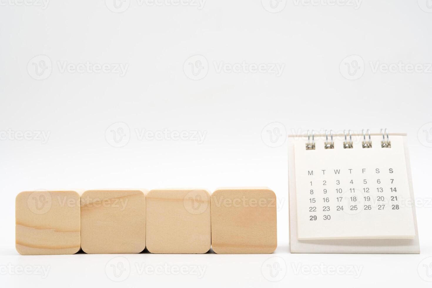 Mockup calendar with wooden cube shape. space for your text. Planing concept. Start new year with goal plan. action plan, strategy. photo