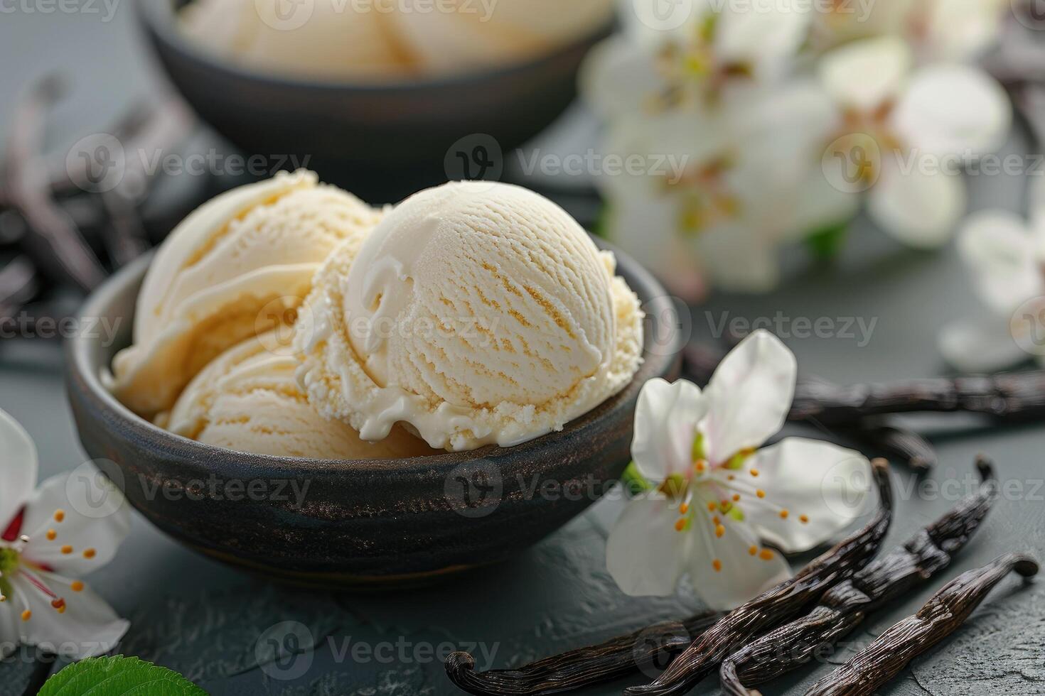 Vanilla ice cream with flowers and vanilla pods photo